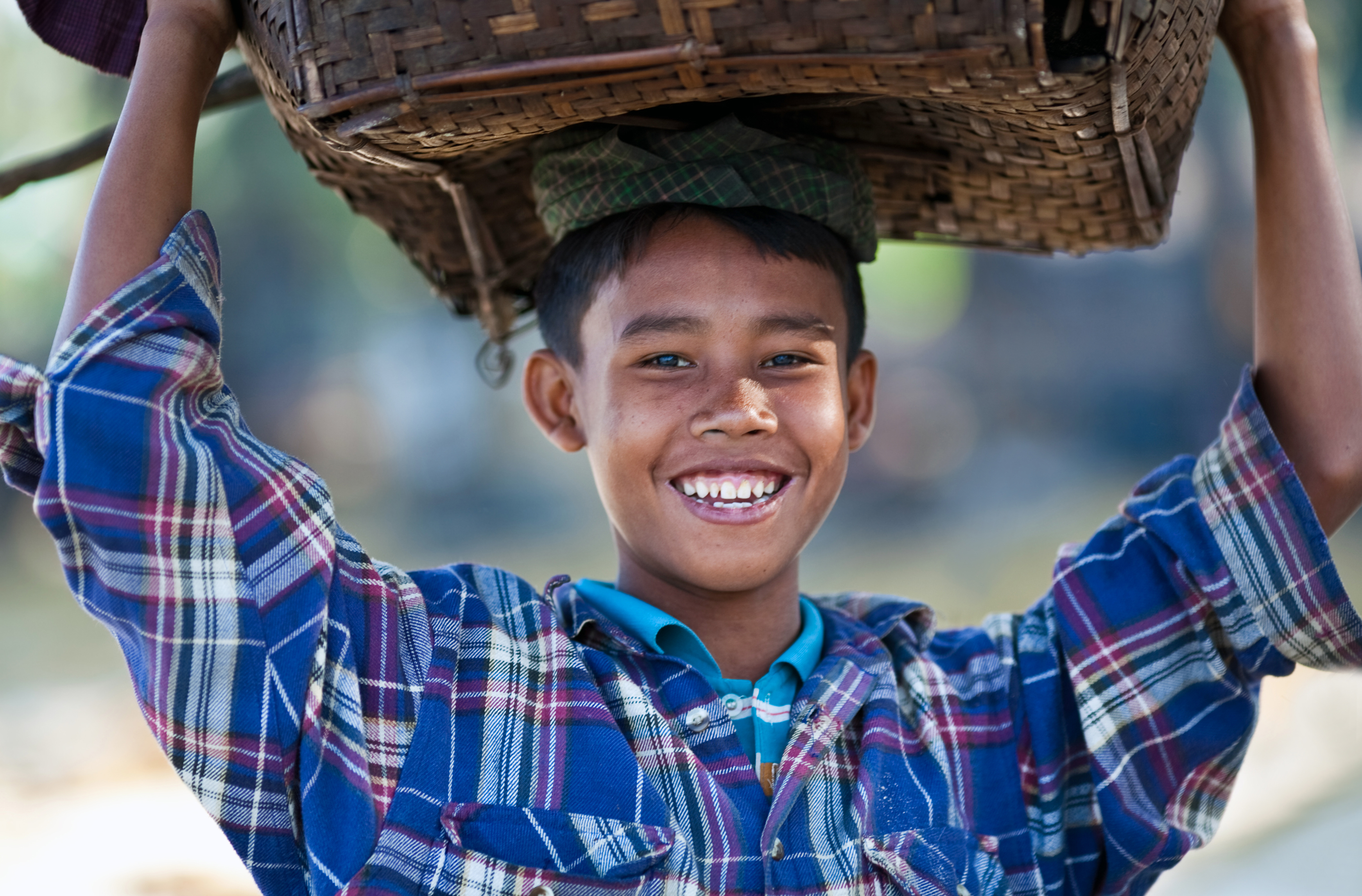 young-boy-carrying-basket