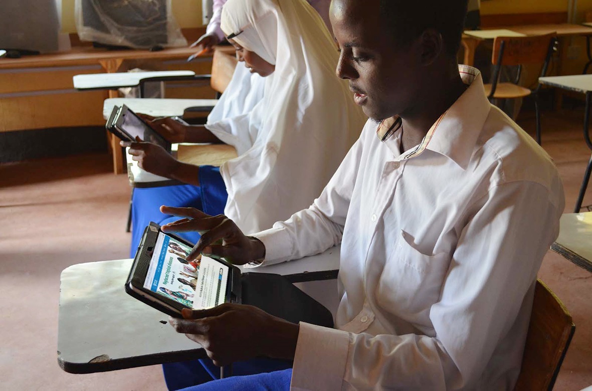 Students-use-tablets-to-study-NTD-online-courses-Kenya Students use tablets to study NTD online courses in Dadaab, Kenya.