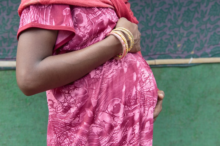pregnant-women-india A pregnant woman in Nadi, present for an antenatal check-up during a primary health care outreach session. Gurugram district, Haryana State, India. August 2019.