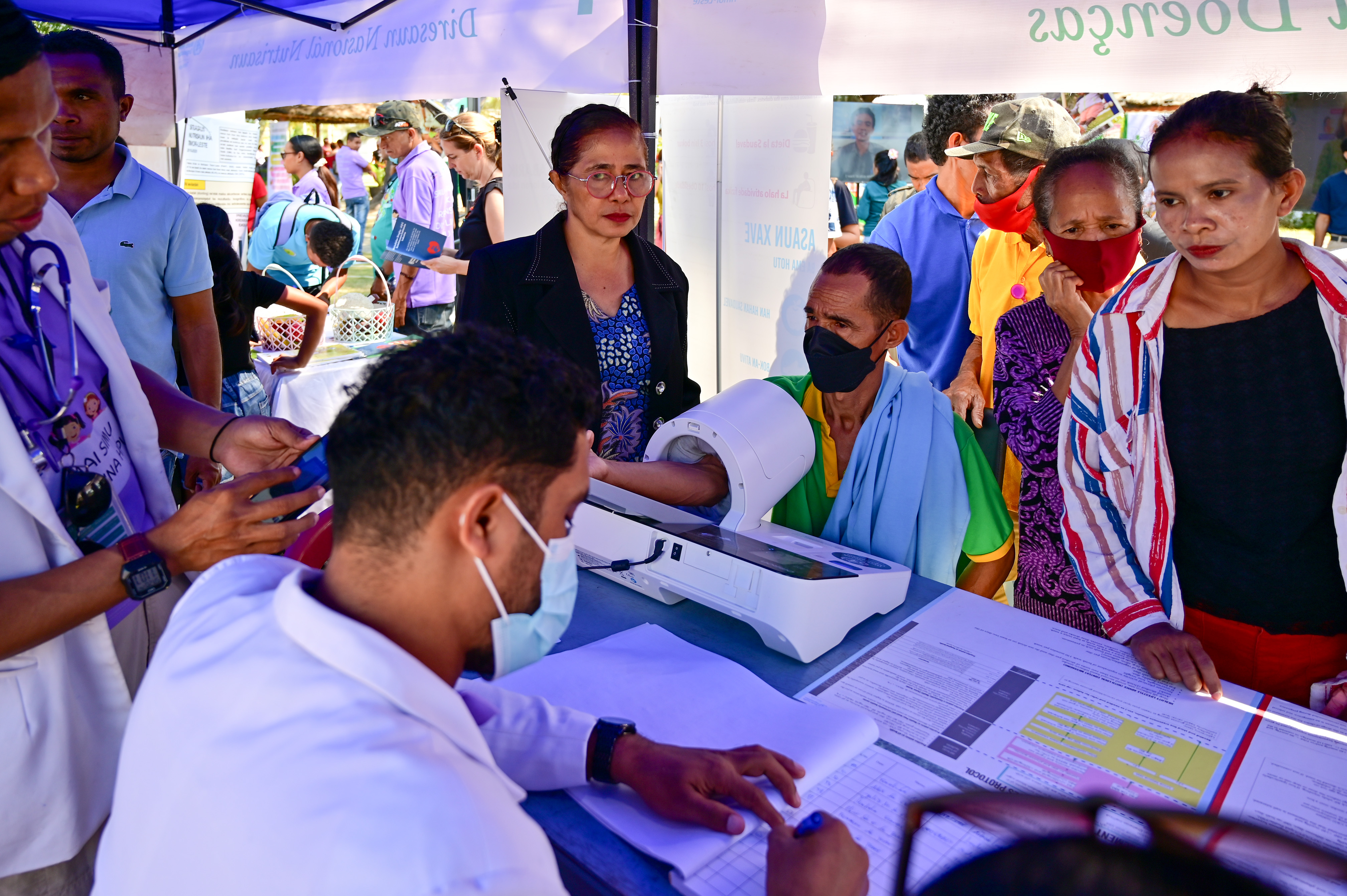 NCD stall offering checks on BP, blood sugar levels, and Body Mass Index (BMI)