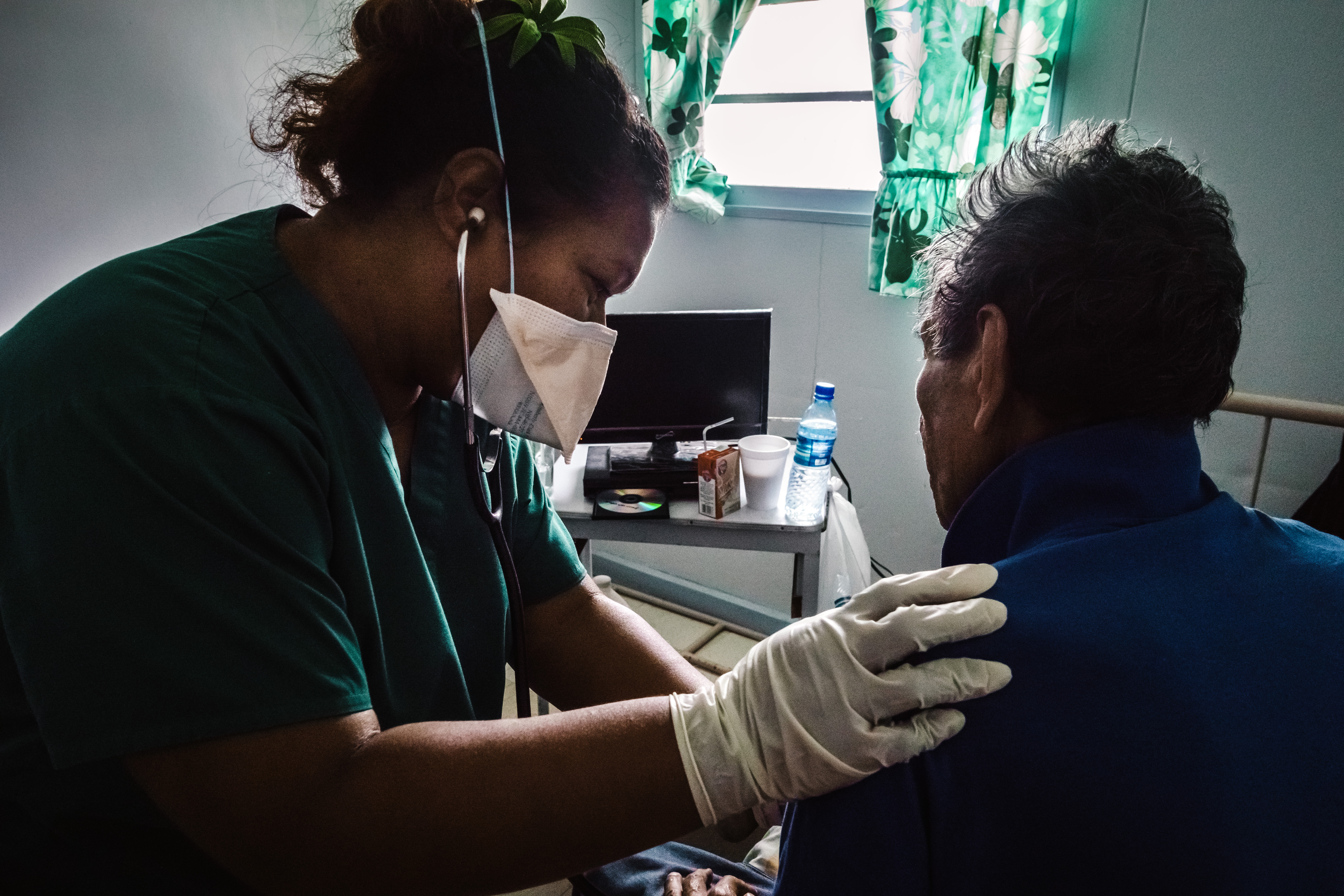 Implementing the End TB Strategy   TB patient and nurse