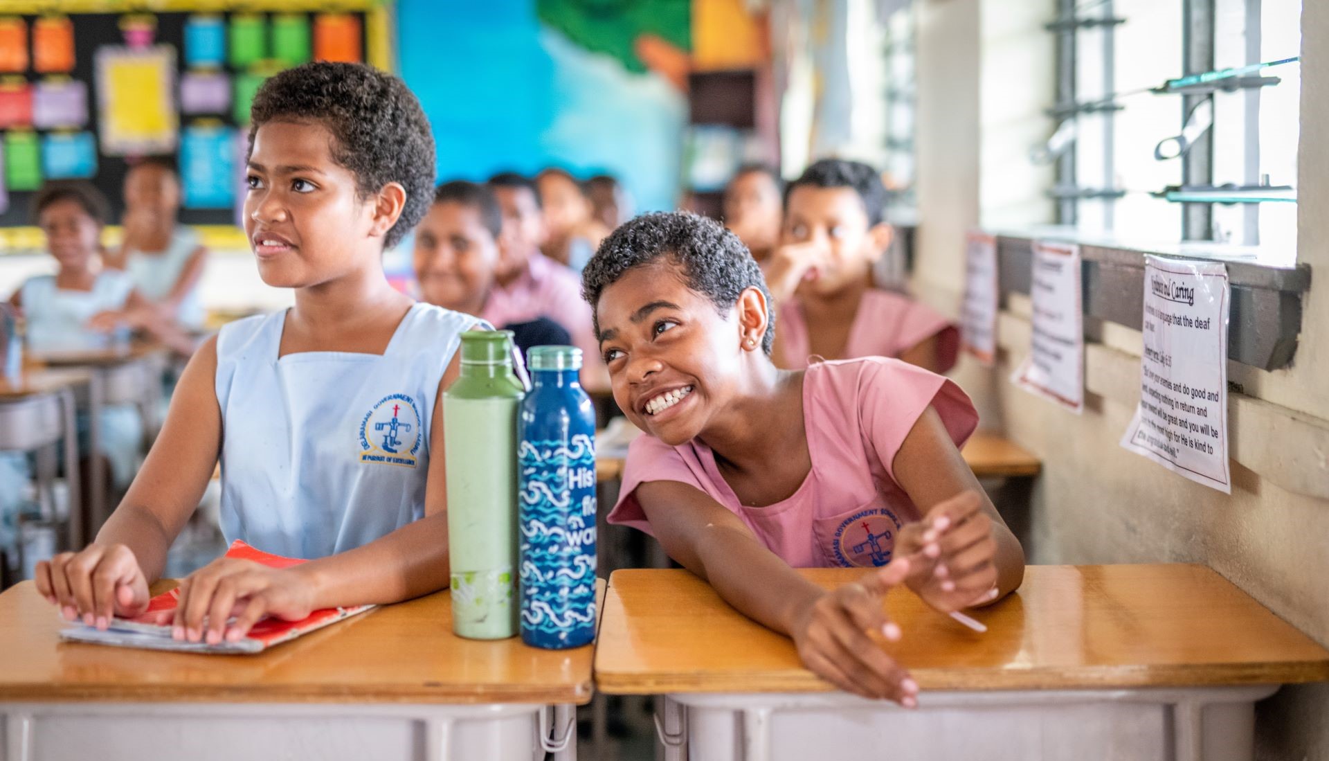 WP48699 Two girls sitting at their desk at school